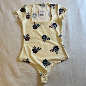 Free People NWT bodysuit. Small. Never worn.